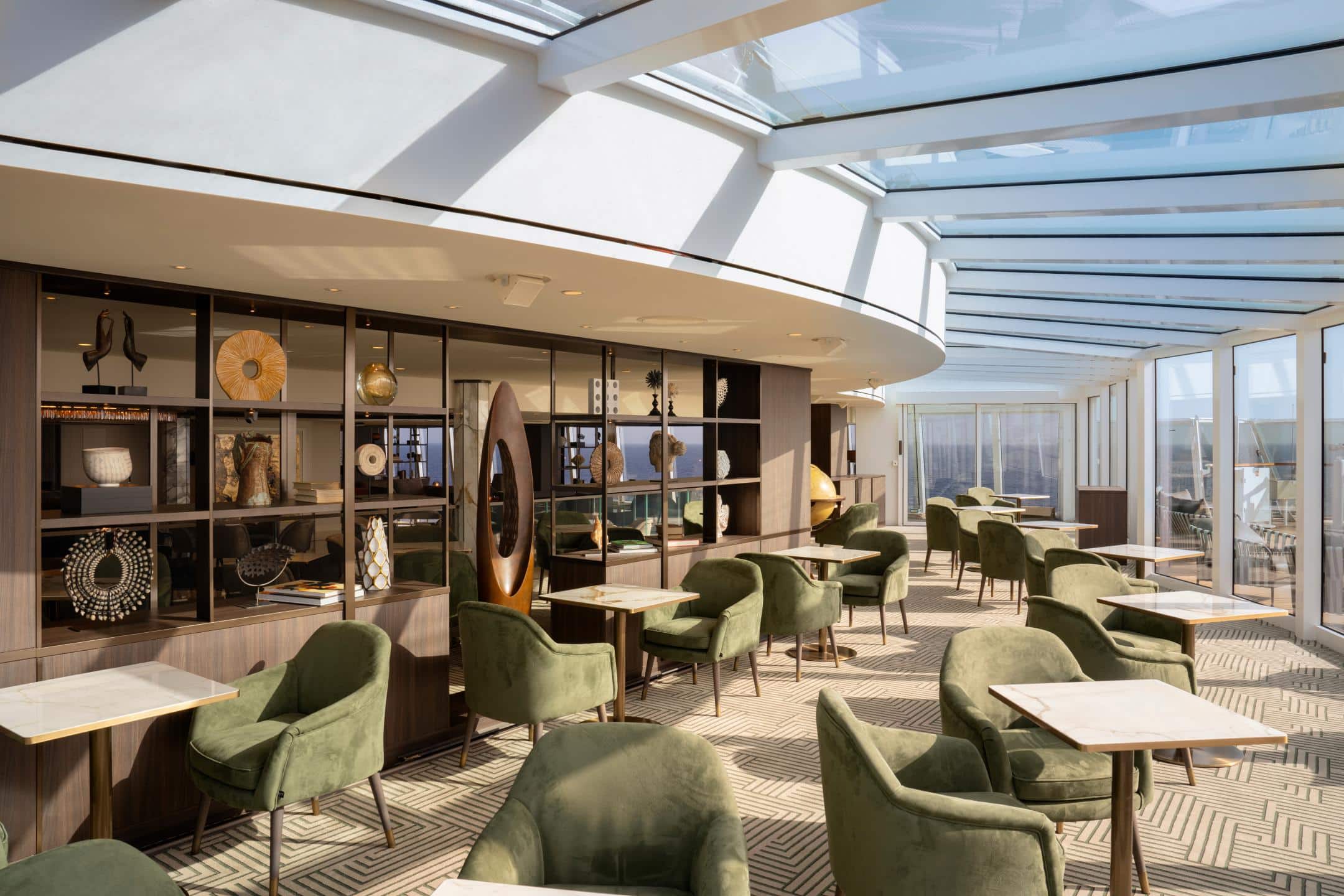 EXPLORA I lounge with floor-to-ceiling windows and sea views