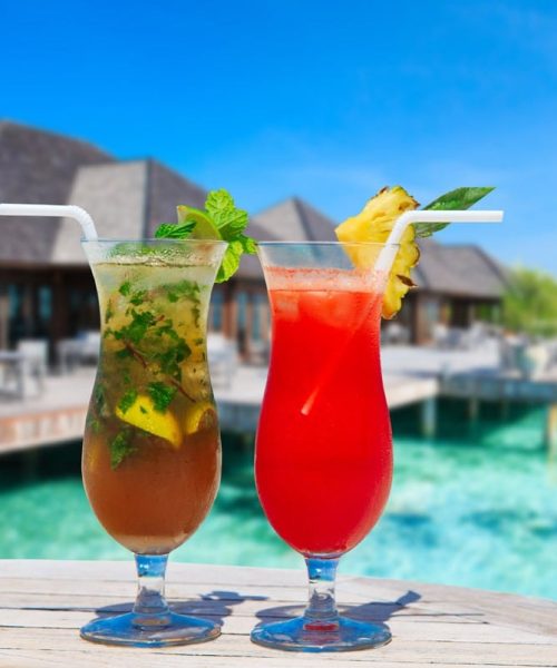cocktail with blur beach on background